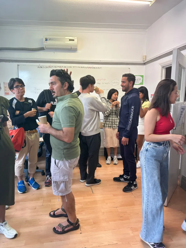 Students making friends and laughing in the common room.