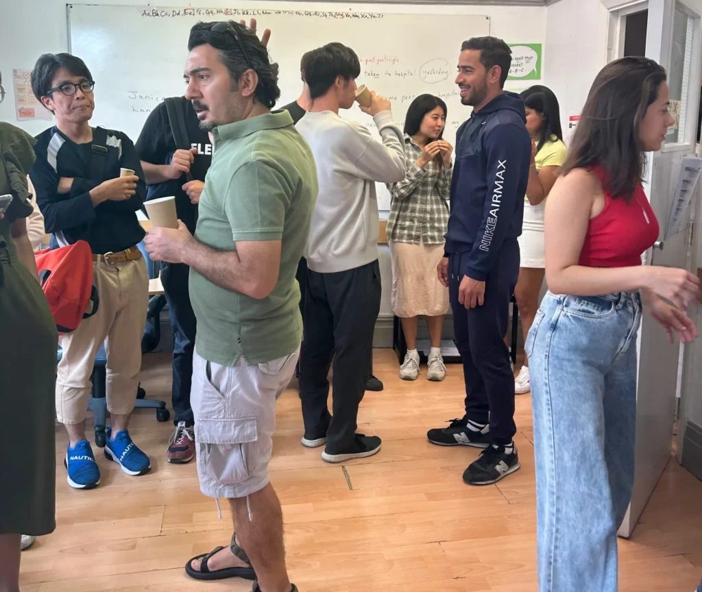 Students making friends and laughing in the common room.